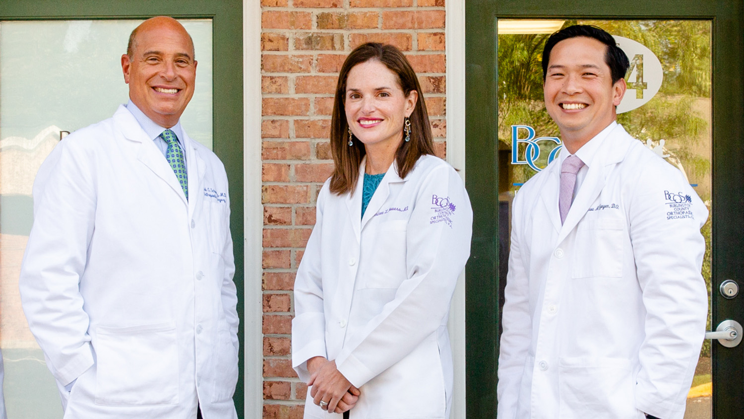Dr. Nguyen, Dr. Schwartz, and Dr. Bowers posing with smiles